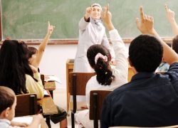happy-children-with-their-teacher-classroom-doing (1)